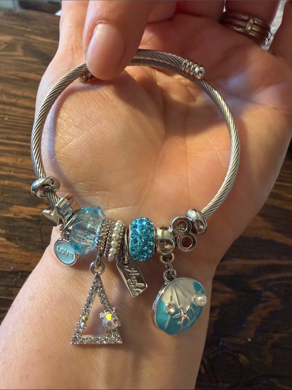 Silver-Tone with Charm Bracelet with Light Blue Crystal Accents